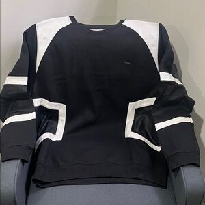 Elegant Black and White Crewneck Sweater